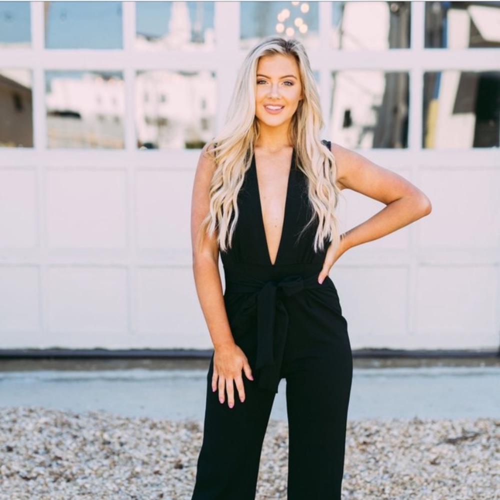 Black plunge neck jumpsuit
